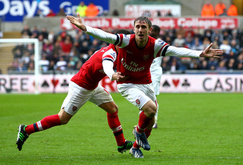 Nacho Monreal celebrates his opening goal for Arsenal in the 2-0 win at Swansea City.