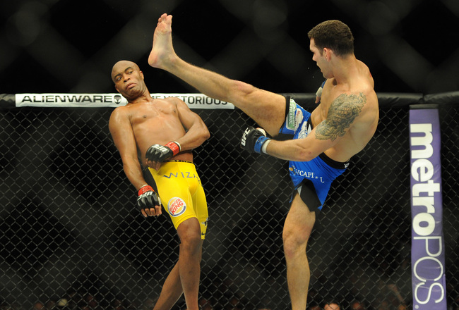 UFC 162: Silva vs Weidman; Lamas vs Korean Zombie; Muñoz vs Boetsch; Edgar vs Oliveira - Página 12 Hi-res-7488160_crop_650x440