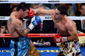 hi-res-180593496-danny-garcia-throws-a-right-at-lucas-matthysse-during_display_image.jpg