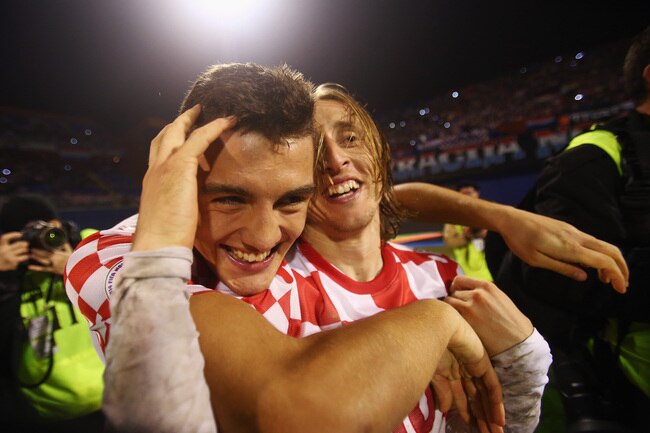 Hi-res-450600707-luka-modric-of-croatia-celebrates-with-team-mate-mateo_crop_650