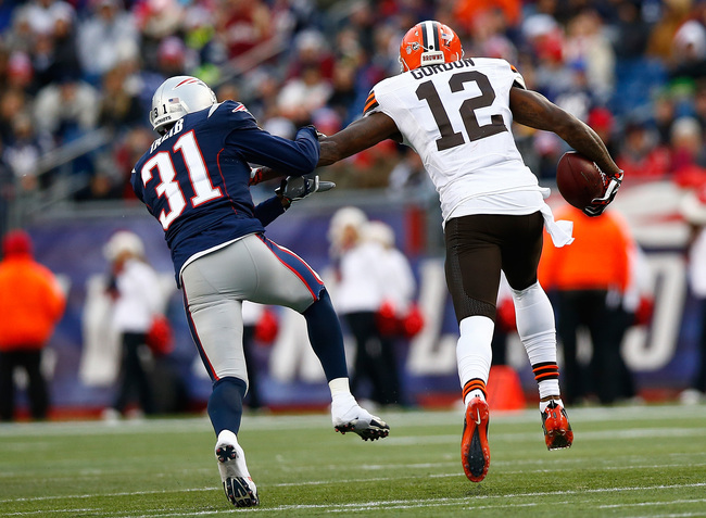 hi-res-454327885-josh-gordon-of-the-cleveland-browns-stiff-arms-aqib_crop_650.jpg