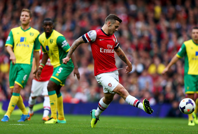 Hi-res-185346916-jack-wilshere-of-arsenal-scores-their-first-goal-during_crop_650