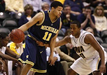 13 MAR 2008: Michigan guard David Merritt guarded by Iowa Hawkeyes guard Tony Freeman (11) during the Michigan Wolverines 55-47 win over the  Iowa Hawkeyes at Conseco Fieldhouse in Indianapolis, Indiana.