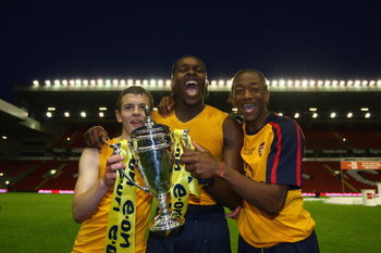 LIVERPOOL, ENGLAND - MAY 26: (L-R) Arsenals Jack Wilshere, Jay Emmanuel Thomas and Sanchez Watt celebrate winning the FA Youth Cup during the second leg of the FA Youth Cup final sponsored by E.ON, between Liverpool and Arsenal at Anfield on May 26, 2009