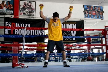 LOS ANGELES, CA - SEPTEMBER 29:Israel Vasquez Two-time Junior Featherweight World Champion stretches before his workout session at Urbina Westside Boxing Gym on September 29, 2009 in Los Angeles, California. Vasquez will return to the ring to face Angel P