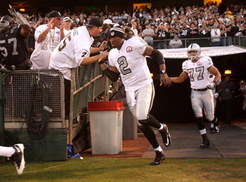 OAKLAND, CA - SEPTEMBER 14: JaMarcus Russell #2 of the Oakland Raiders runs on to the field before their game against the San Diego Chargers on September 14, 2009 at the Oakland-Alameda County Coliseum in Oakland, California. (Photo by Ezra Shaw/Getty I