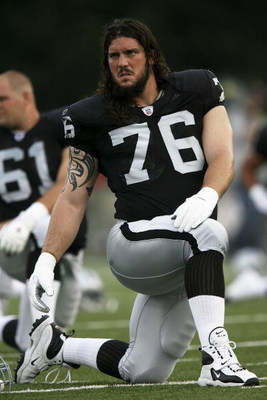 CANTON, OH - AUGUST 06: Offensive lineman Robert Gallery #76 of the Oakland Raiders stretches prior to taking on the Philadelphia Eagles in the AFC-NFC Pro Football Hall of Fame Game at Fawcett Stadium on August 6, 2006 in Canton, Ohio. (Photo by Doug B
