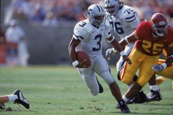 8 Sep 2001:  Quarterback Ell Robertson #3 of the Kansas State Wildcats running with the ball followed by Lonnie Ford #25 during the game against the Southern California (USC) Trojans at the Coliseum in Los Angeles, California. The Wildcats defeated the Tr