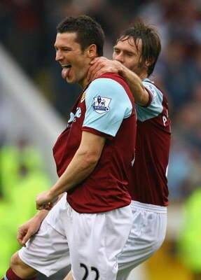 BURNLEY, ENGLAND - SEPTEMBER 19:  David Nugent of Burnley celebrates with Graham Alexander after scoring his second goal during the Barclays Premier League match between Burnley and Sunderland at Turf Moor on September 19, 2009 in Burnley, England.  (Phot