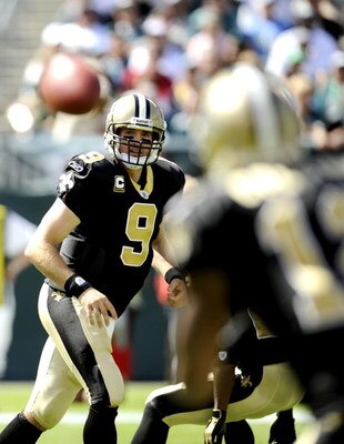 PHILADELPHIA - SEPTEMBER 20:  Drew Brees #9 of the New Orleans Saints looks for an open man during a game against the Philadelphia Eagles at Lincoln Financial Field on September 20, 2009 in Philadelphia, Pennsylvania.  (Photo by Jeff Zelevansky/Getty Imag