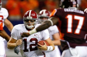 ATLANTA - SEPTEMBER 05:  Quarterback Greg McElroy #12 of the Alabama Crimson Tide rushes upfield against the Virginia Tech Hokies during the Chick-fil-A Kickoff Game at Georgia Dome on September 5, 2009 in Atlanta, Georgia.  (Photo by Kevin C. Cox/Getty I