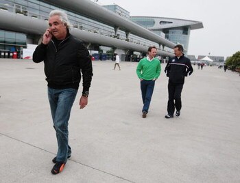 SHANGHAI, CHINA - APRIL 16:  (L-R) Renault Team Principal Flavio Briatore, Red Bull Racing Team Principal Christian Horner and BMW Sauber Team Principal Mario Theissen walk in the paddock during previews to the Chinese Formula One Grand Prix at the Shangh