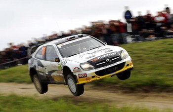 MIKOLAJKI, POLAND - JUNE 28:  Petter Solberg of Norway and Phil Mills of Great Britain compete in their Citroen Xsara during the third leg of the WRC Rally of Poland on June 28, 2009 in Mikolajki, Poland.  (Photo by Massimo Bettiol/Getty Images)