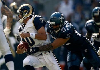 SEATTLE , WA - SEPTEMBER 13:  Lofa Tatupu #51 of the Seattle Seahawks sacks Marc Bugler #10 of the St. Louis Rams at Qwest Field on September 13, 2009 in Seattle, Washington.  (Photo by Jonathan Ferrey/Getty Images)