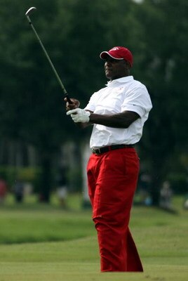 LUTZ, FL - APRIL 17: NFL linebacker Derrick Brooks watches his shot on the 18th hole during the first round of the Outback Steakhouse Pro-Am at TPC Tampa Bay on April 17, 2009  in Lutz, Florida.  (Photo by Marc Serota/Getty Images)