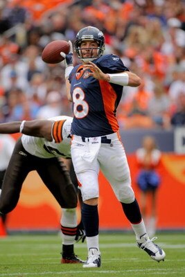 DENVER - SEPTEMBER 20:  Quarterback Kyle Orton #8 of the Denver Broncos delivers a pass against the Cleveland Browns during NFL action at Invesco Field at Mile High on September 20, 2009 in Denver, Colorado. Orton had 263 yards passing as the Broncos defe