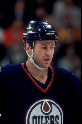 13 Feb, 1997:  Kevin Lowe #4 of the Edmonton Oilers in action during a game against the Calgary Flames at the Canadien Airlines Saddledome in Calgary Canada. Mandatory Credit: Ian Tomlinson  /Allsport
