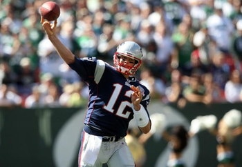 EAST RUTHERFORD, NJ - SEPTEMBER 20:  Tom Brady #12 of the New England Patriots passes against the New York Jets at Giants Stadium on September 20, 2009 in East Rutherford, New Jersey.  (Photo by Nick Laham/Getty Images)