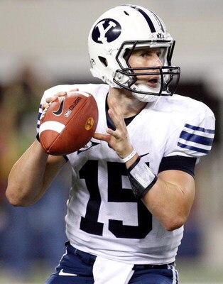 ARLINGTON, TX - SEPTEMBER 05:  Quarterback Max Hall #15 of the Brigham Young Cougars drops back to pass against the Oklahoma Sooners at Cowboys Stadium on September 5, 2009 in Arlington, Texas.  (Photo by Ronald Martinez/Getty Images)