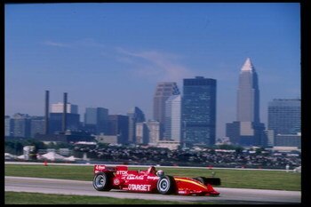 13 Jul 1997:  Alex Zanardi of Italy appears to race past the skyline at the Medic Drug Grand Prix of Cleveland at the Burke Lakefront Airport in Cleveland,  Ohio. Mandatory Credit: David Taylor  /Allsport