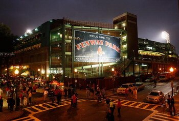 BOSTON - OCTOBER 16:  Fans of the Boston Red Sox arrive to Fenway Park before game five of the American League Championship Series against the Tampa Bay Rays during the 2008 MLB playoffs on October 16, 2008 in Boston, Massachusetts.  (Photo by Jim Rogash/