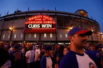 CHICAGO - JULY 06:  Cubs fans leave Wrigley Filed, after the Chicago Cubs defeated the Atlanta Braves 4-2, July 6, 2009 in Chicago, Illinois. The Tribune Company, which owns the Cubs and the ballpark, has reached a deal, reported to be worth around $900 m