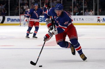 NEW YORK - SEPTEMBER 24:  Evgeny Grachev #59 of the New York Rangers skates against the Washington Capitals during their preseason game on  September 24, 2009 at Madison Square Garden in New York City.  (Photo by Jim McIsaac/Getty Images)