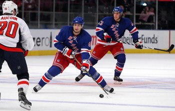 NEW YORK - SEPTEMBER 24:  Enver Lisin #81 of the New York Rangers skates against the Washington Capitals during their preseason game on  September 24, 2009 at Madison Square Garden in New York City.  (Photo by Jim McIsaac/Getty Images)