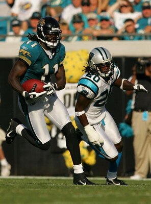 JACKSONVILLE, FL - DECEMBER 09:  Reggie Williams #11 of the Jacksonville Jaguars runs in a game against the Carolina Panthers at Jacksonville Municipal Stadium on December 9, 2007 in Jacksonville, Florida.  The Jagaurs beat the Panthers 37-6.  (Photo by S