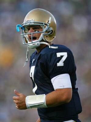 SOUTH BEND, IN - SEPTEMBER 19: Jimmy Clausen #7 of the Notre Dame Fighting Irish celebrates a touchdown pass against the Michigan State Spartans on September 19, 2009 at Notre Dame Stadium in South Bend, Indiana. Notre Dame defeated Michigan State 33-30. 