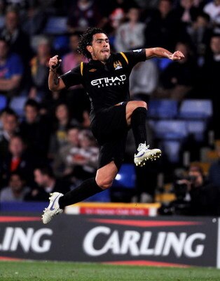 LONDON, ENGLAND - AUGUST 27:  Carlos Tevez of Manchester City celebrates after scoring during the Carling Cup second round match between Crystal Palace and Manchester City at Selhurst Park on August 27, 2009 in London, England.  (Photo by Shaun Botterill/