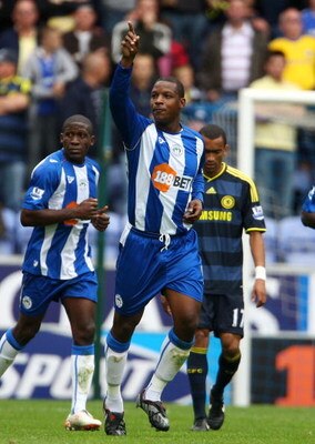 WIGAN, ENGLAND - SEPTEMBER 26:  Titus Bramble of Wigan Athletic celebrates scoring during the Barclays Premier League match between Wigan Athletic and Chelsea at DW Stadium on September 26, 2009 in Wigan, England.  (Photo by Phil Cole/Getty Images)