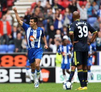 WIGAN, ENGLAND - SEPTEMBER 26: Paul Scharner of Wigan Athletic celabrates scoring during the Barclays Premier League match between Wigan Athletic and Chelsea at DW Stadium on September 26, 2009 in Wigan, England.  (Photo by Phil Cole/Getty Images)