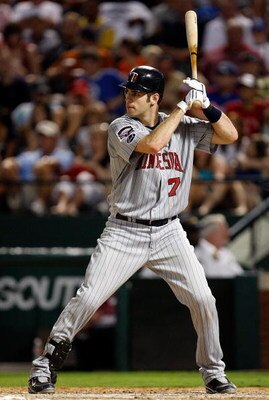 ARLINGTON, TX - JULY 17:  Catcher Joe Mauer #7 of the Minnesota Twins on July 17, 2009 at Rangers Ballpark in Arlington, Texas.  (Photo by Ronald Martinez/Getty Images)