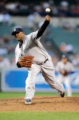 BALTIMORE - SEPTEMBER 02:  CC Sabathia #52 of the New York Yankees pitches against the Baltimore Orioles at Camden Yards on September 2, 2009 in Baltimore, Maryland.  (Photo by Greg Fiume/Getty Images)
