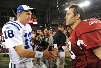 GLENDALE, AZ - SEPTEMBER 27:  (L-R) Peyton Manning #18 of the Indianapolis Colts shakes hands with Kurt Warner #13 of the Arizona Cardinals after the Colts defeated the Cardinals 31-10 during the game at University of Phoenix Stadium on September 27, 2009
