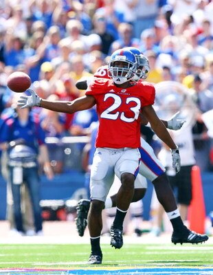 LAWRENCE, KS - SEPTEMBER 26:  Ryan Murphy #23 of the Kansas Jayhawks reacts after making an interception during the game against the Southern Mississippi Golden Eagles on September 26, 2009 at Memorial Stadium in Lawrence, Kansas.  (Photo by Jamie Squire/