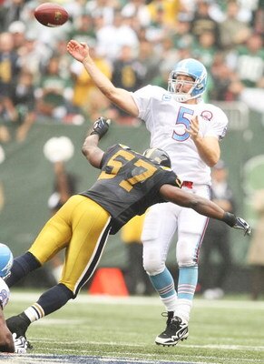 EAST RUTHERFORD, NJ - SEPTEMBER 27:  Bart Scott #57 of The New York Jets hits Kerry Collins #5 of The Tennessee Titans as he passes during their game on September 27, 2009 at Giants Stadium in East Rutherford, New Jersey.  (Photo by Al Bello/Getty Images)