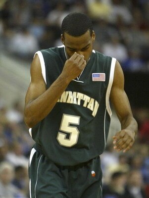 RALEIGH, NC - MARCH 20:  Jason Wingate #5 of the Manhattan Jaspers walks off the floor dejected after the first half during the second round game of the NCAA Division I Men's Basketball Tournament against the Wake Forest Demon Deacons on March 20, 2004 at