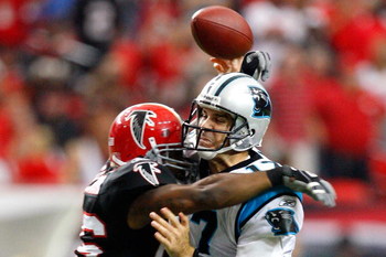 ATLANTA - SEPTEMBER 20: Erik Coleman #26 of the Atlanta Falcons breaks up a pass by quarterback Jake Delhomme #17 of the Carolina Panthers at Georgia Dome on September 20, 2009 in Atlanta, Georgia. (Photo by Kevin C. Cox/Getty Images)