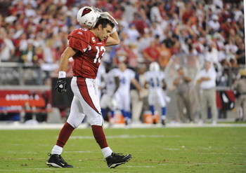 GLENDALE, AZ - SEPTEMBER 27: Quarterback Kurt Warner #13 of the Arizona Cardinals reacts at the end of the second quarter against the Indianapolis Colts during the game at University of Phoenix Stadium on September 27, 2009 in Glendale, Arizona. (Photo b