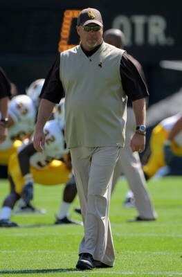 BOULDER, CO - SEPTEMBER 19:  Head coach Dave Christensen of the Wyoming Cowboys prepares to lead his team against the Colorado Buffaloes at Folsom Field on September 19, 2009 in Boulder, Colorado. The Buffaloes defeated the Cowboys 24-0.  (Photo by Doug P