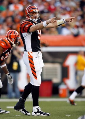 CINCINNATI - SEPTEMBER 27:  Carson Palmer #9 of the Cincinnati Bengals gives instructions to his team during the NFL game against the Pittsburgh Steelers at Paul Brown Stadium on September 27, 2009 in Cincinnati, Ohio.  The Bengals won 23-20.  (Photo by A