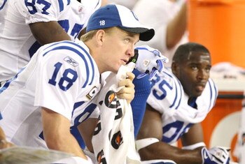 GLENDALE, AZ - SEPTEMBER 27:  Quarterback Peyton Manning #18 of the Indianapolis Colts looks on from the bench in the fourth quarter against the Arizona Cardinals during the game at University of Phoenix Stadium on September 27, 2009 in Glendale, Arizona.