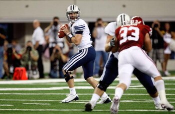 ARLINGTON, TX - SEPTEMBER 05:  Quarterback Max Hall #15 of the Brigham Young Cougars drops back to pass against the Oklahoma Sooners at Cowboys Stadium on September 5, 2009 in Arlington, Texas.  (Photo by Ronald Martinez/Getty Images)