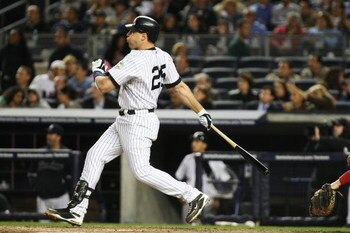 NEW YORK - SEPTEMBER 25:  Mark Teixeira #25 of The New York Yankees hits the ball against The Boston Red Sox during their game on September 25, 2009 at Yankee Stadium in the Bronx Borough of New York.  (Photo by Al Bello/Getty Images)