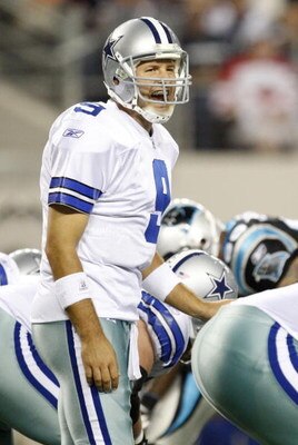 ARLINGTON, TX - SEPTEMBER 28:  Tony Romo #9 of the Dallas Cowboys calls a play gainst the Carolina Panthers at Cowboys Stadium on September 28, 2009 in Arlington, Texas. (Photo by Ronald Martinez/Getty Images)