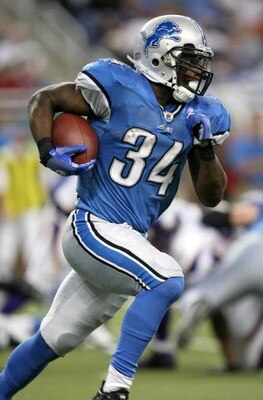 DETROIT - SEPTEMBER 20:  Running back Kevin Smith #34 of the Detroit Lions carries the bll against the Minnesota Vikings at Ford Field on September 20, 2009 in Detroit, Michigan. The Vikings won 27-13.  (Photo by Stephen Dunn/Getty Images)