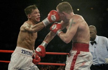 ATLANTIC CITY, NJ - JUNE 7:  Arturo Gatti lands a right to Micky Ward during their Junior Welterweight bout at Boardwalk Hall on June 7, 2003 in Atlantic City, New Jersey. Gatti won a unanimous decision. (Photo by Al Bello/Getty Images)