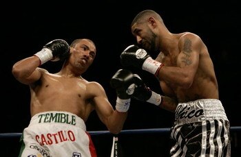 LAS VEGAS - OCTOBER 08:  Jose Luis Castillo of Mexico throws a left upper cut against Diego 'Chico' Corrales during their Bout October 8, 2005 at the Thomas & Mack Center on the campus of UNLV in Las Vegas, Nevada. Castillo won by knockout in the 4th roun